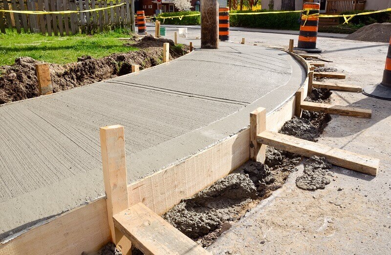 Concrete sidewalks with forms still on them.